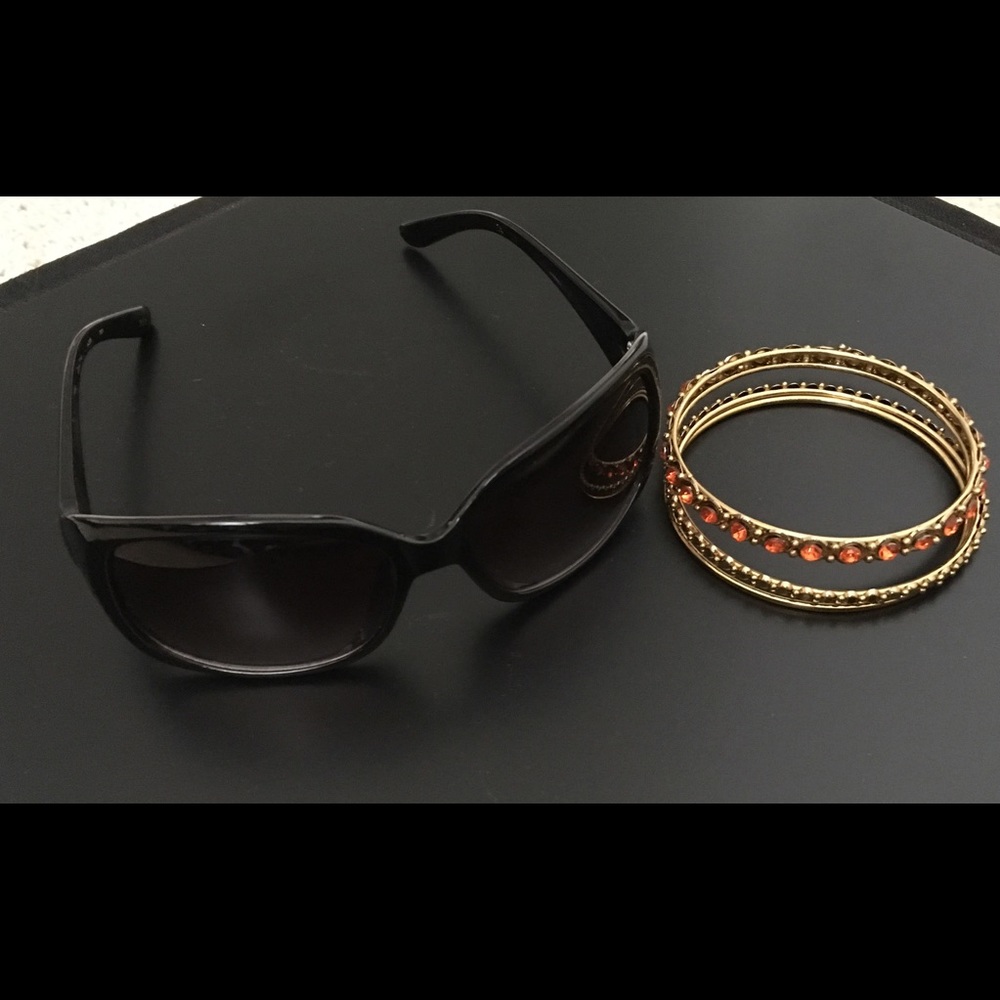 Sunglasses and bangle bracelets